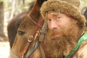 Close up Derik with his mule. Photo courtesy of NG Studios/Mary Way